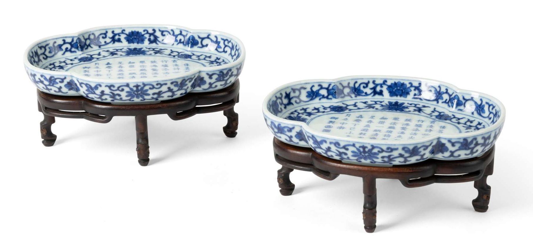 FINE PAIR OF INSCRIBED BLUE AND WHITE TEA TRAYS | QING DYNASTY, JIAQING MARK AND OF THE PERIOD | £65,200 incl premium