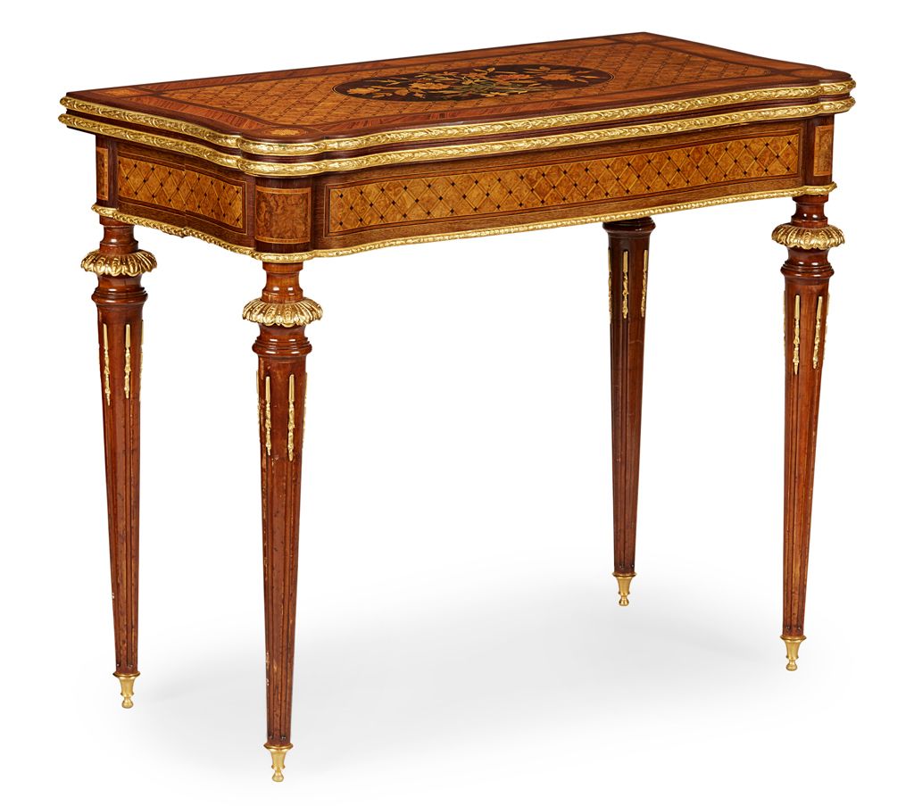 GOOD VICTORIAN AMARANTH, KINGWOOD, PARQUETRY AND MARQUETRY FOLD-OVER GAMES TABLE LATE 19TH CENTURY  Sold for £3,500