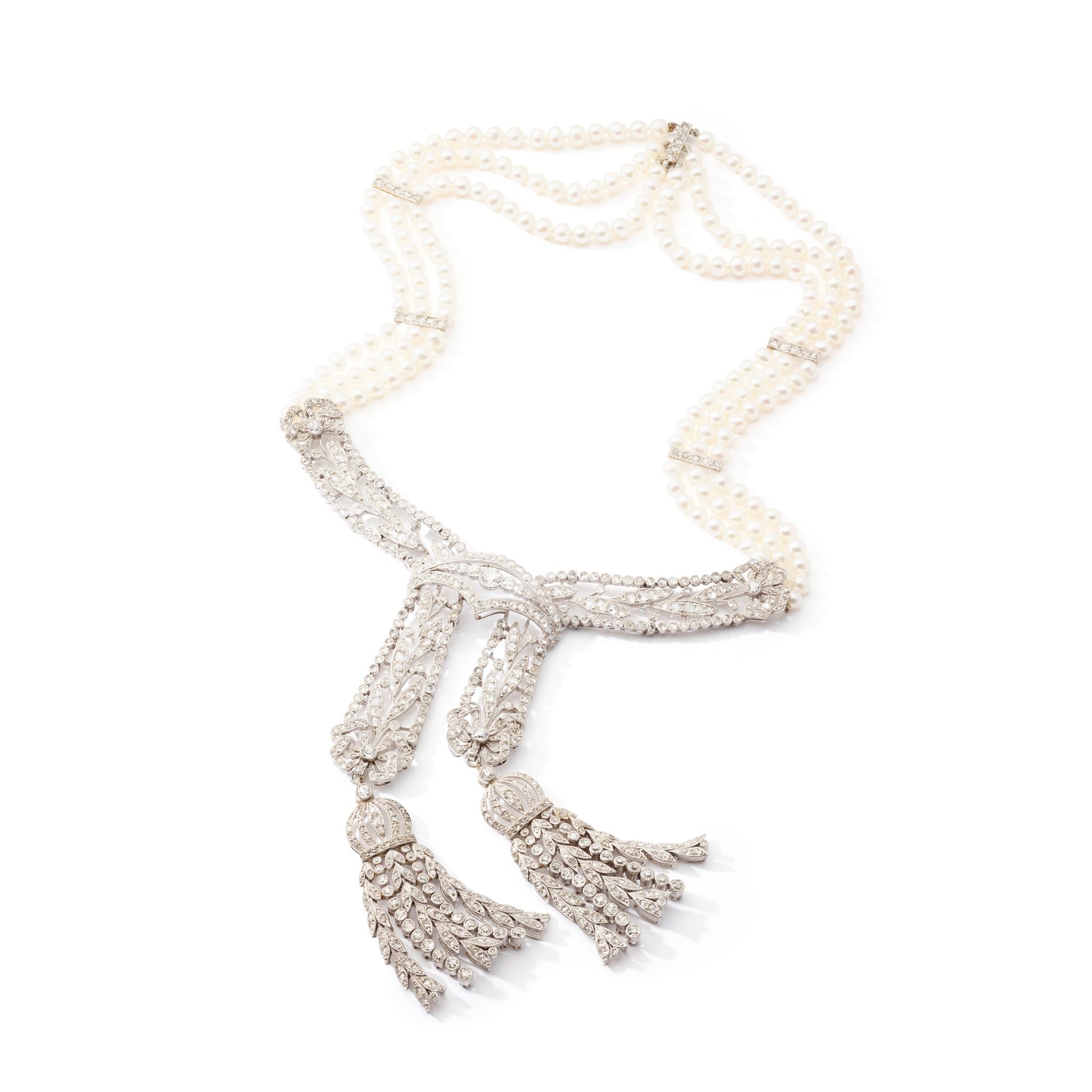 A BELLE ÉPOQUE SEED PEARL AND DIAMOND NECKLACE/EARRINGS, CIRCA 1910 | Sold for £42,700