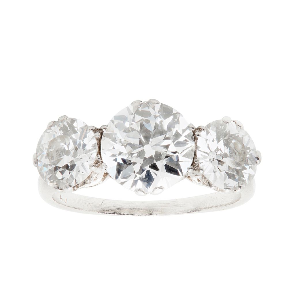 A THREE STONE DIAMOND SET RING  Sold for £10,625