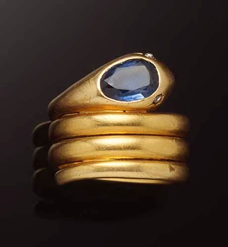 A VICTORIAN GENTLEMAN'S 18CT GOLD MOUNTED SNAKE RING  Sold for £1,666