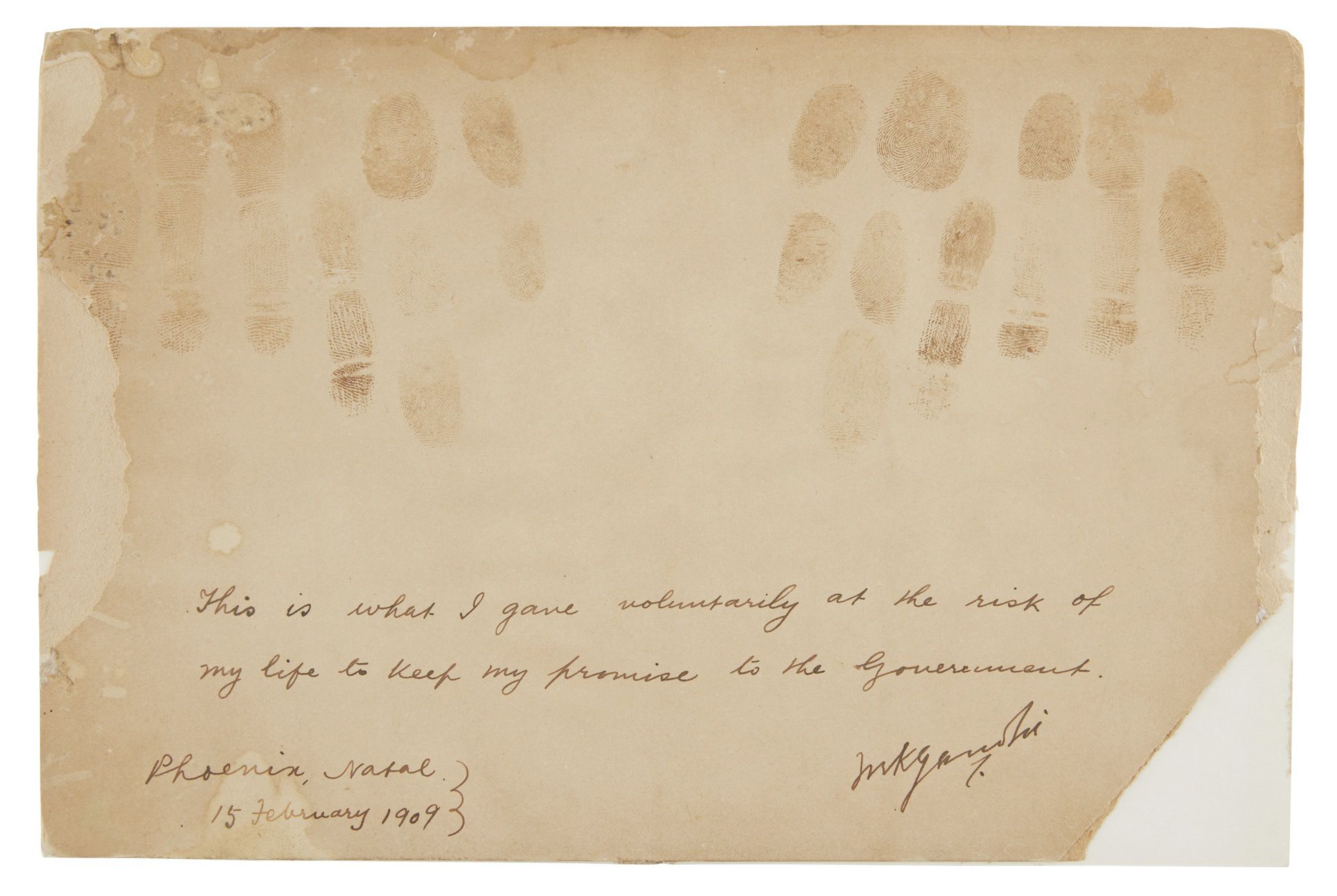 GANDHI, MOHANDAS FINGERPRINTS AND SIGNATURE, ON CARDBOARD  Sold for £107,500