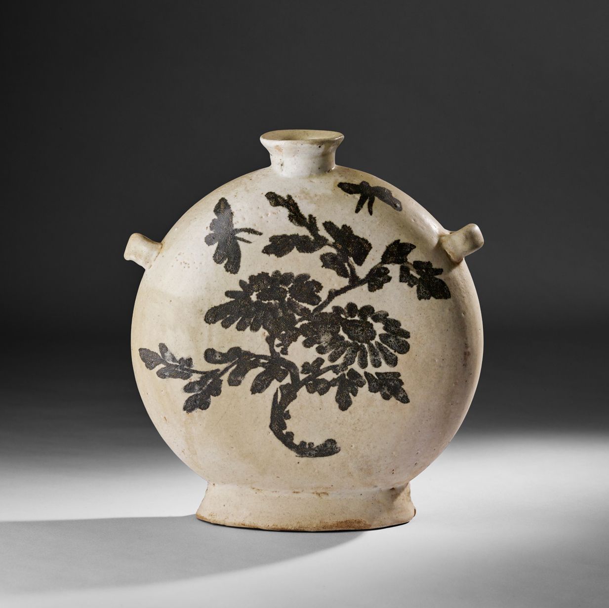 RARE IRON-PAINTED 'CHRYSANTHEMUM AND BAMBOO' HANDLED MOONFLASK JOSEON DYNASTY, 18TH-19TH CENTURY Sold for £4,284